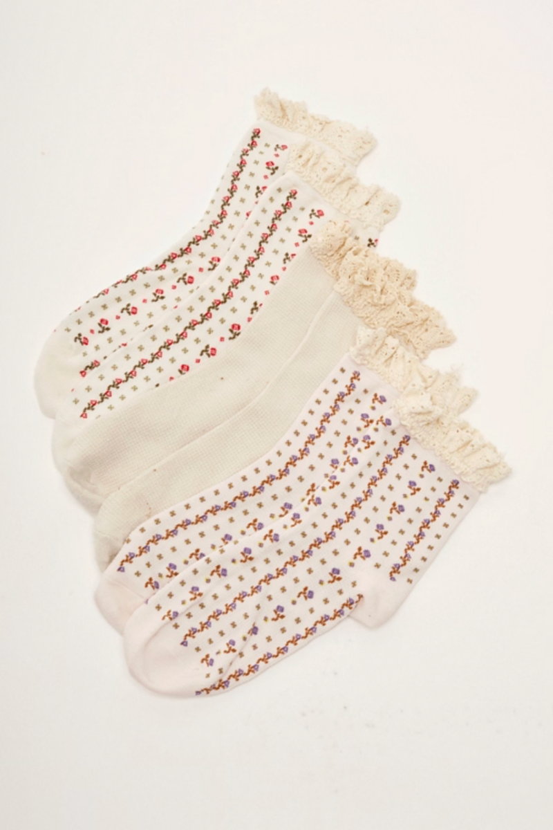Trestles Clothing Company ruffle crew socks in a 3-pack with waffle knit texture and vintage floral patterns